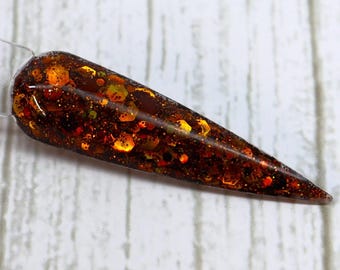 Polvo para untar de caramelo especiado: marrón cálido con brillo cobrizo dorado, duradero y resistente al descascarillado.