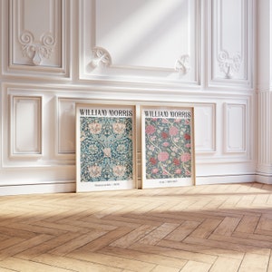 May include: Two framed prints of floral patterns by William Morris. The print on the left is titled "Honeysuckle" and the print on the right is titled "Cray" with the date 1875-1877.