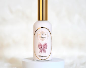 Perfume capilar de flor de malvavisco, de alta calidad y larga duración, seguro para el cabello, en un lujoso envase de vidrio.