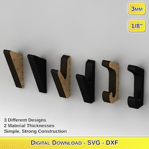 Puede incluir: Seis ganchos de pared en tres diseños diferentes, dos en negro y cuatro en madera con detalles negros. Los ganchos están disponibles en dos espesores: 3 mm y 1/8 de pulgada. El texto "3 diseños diferentes, 2 espesores de material, construcción simple y resistente, DESCARGA DIGITAL - SVG - DXF" está en la parte inferior de la imagen.
