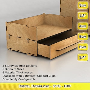 May include: A wooden organiser with two drawers and a pull-out drawer. The organiser is made of wood and has a natural finish. The organiser is stackable and has three different support clips. The organiser is available in six different sizes and six different material thicknesses. The organiser is a digital download and comes in SVG and DXF formats.