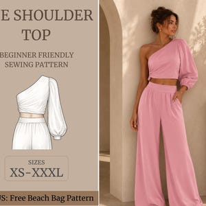 Puede incluir: Un patrón de costura para un top rosa de un solo hombro y pantalones anchos. El texto dice ONE SHOULDER TOP, BEGINNER FRIENDLY SEWING PATTERN, SIZES XS-XXXL y BONUS: Free Beach Bag Pattern. Incluye un dibujo lineal blanco del conjunto.