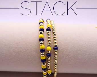 Pulsera azul marino y amarilla Game Day con cuentas rellenas de oro