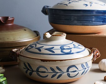 Traditional vintage Minoyaki Hanami style casserole dish in clay with Japanese artisan design