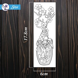 May include: Black and white illustration of a decorative bottle with a floral design. The bottle is 17.8cm tall and 6cm wide. The design includes skulls, crystals, and feathers, with a flowering branch extending upwards. The word "Size" is in the upper left corner.