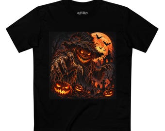 May include: A black t-shirt featuring a graphic print of a menacing scarecrow figure with glowing eyes and a jagged grin, wearing a tattered hat. The scene includes a large orange moon, flying bats, a dark cemetery, and several glowing jack-o'-lanterns.