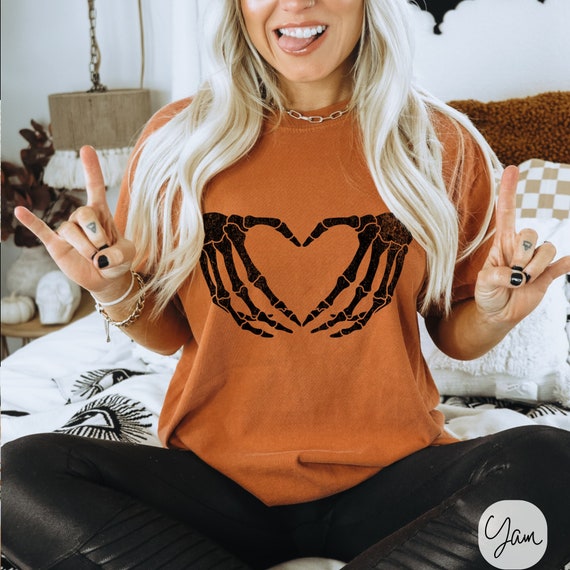 Skeleton Hand Heart Graphic Tee - Retro Halloween Rock On Shirt