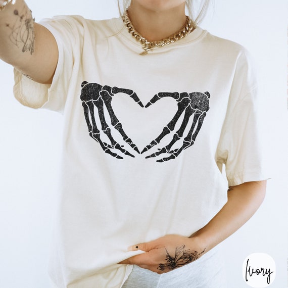 Skeleton Hand Heart Graphic Tee - Spooky Halloween Shirt