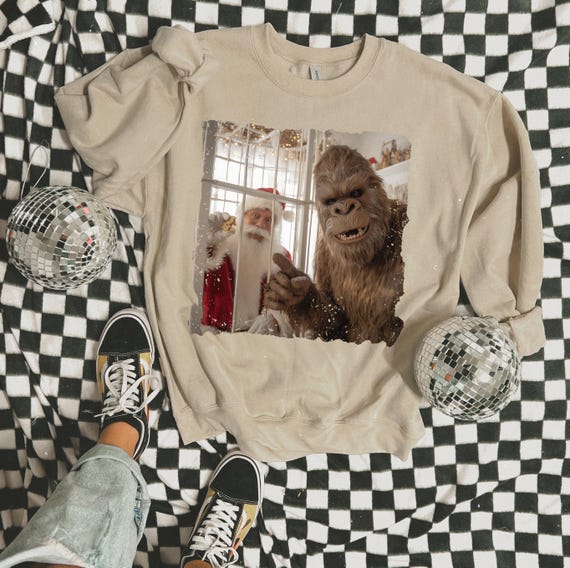 Funny Bigfoot Captures Santa Shirt – Cryptid Christmas Tee | Sasquatch Christmas Shirt | Bigfoot Santa Tee