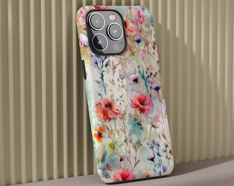 Könnte beinhalten: Eine Handyhülle mit einem Aquarell-Blumenmuster mit rosa, roten, blauen und gelben Blumen auf weißem Hintergrund.
