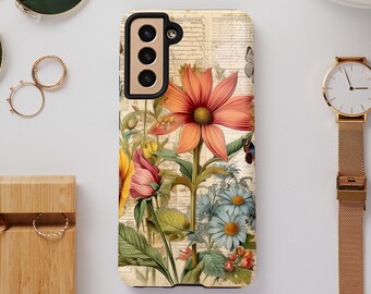 Peut inclure: Coque de téléphone à motif floral vintage avec des fleurs orange, jaunes et bleues, et des papillons. Le boîtier a un module caméra noir. Accessoires : lunettes de soleil et montre dorée. Autres accessoires.