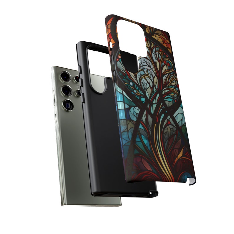 May include: A black phone case with a colorful stained glass design. The case is shown with a phone inside.