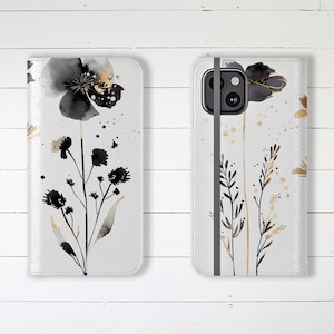 Estuche tipo billetera para teléfono, elegante y moderno, con diseño de flores silvestres en negro y dorado, ranuras para tarjetas de crédito y soporte, estuche tipo billetera de diseño para iPhone y Samsung Galaxy.
