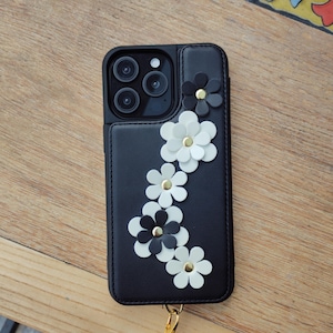 Capa de telefone com suporte magnético para cartão e alça transversal e alça de mão, capa com padrão de flores para iPhone e Samsung