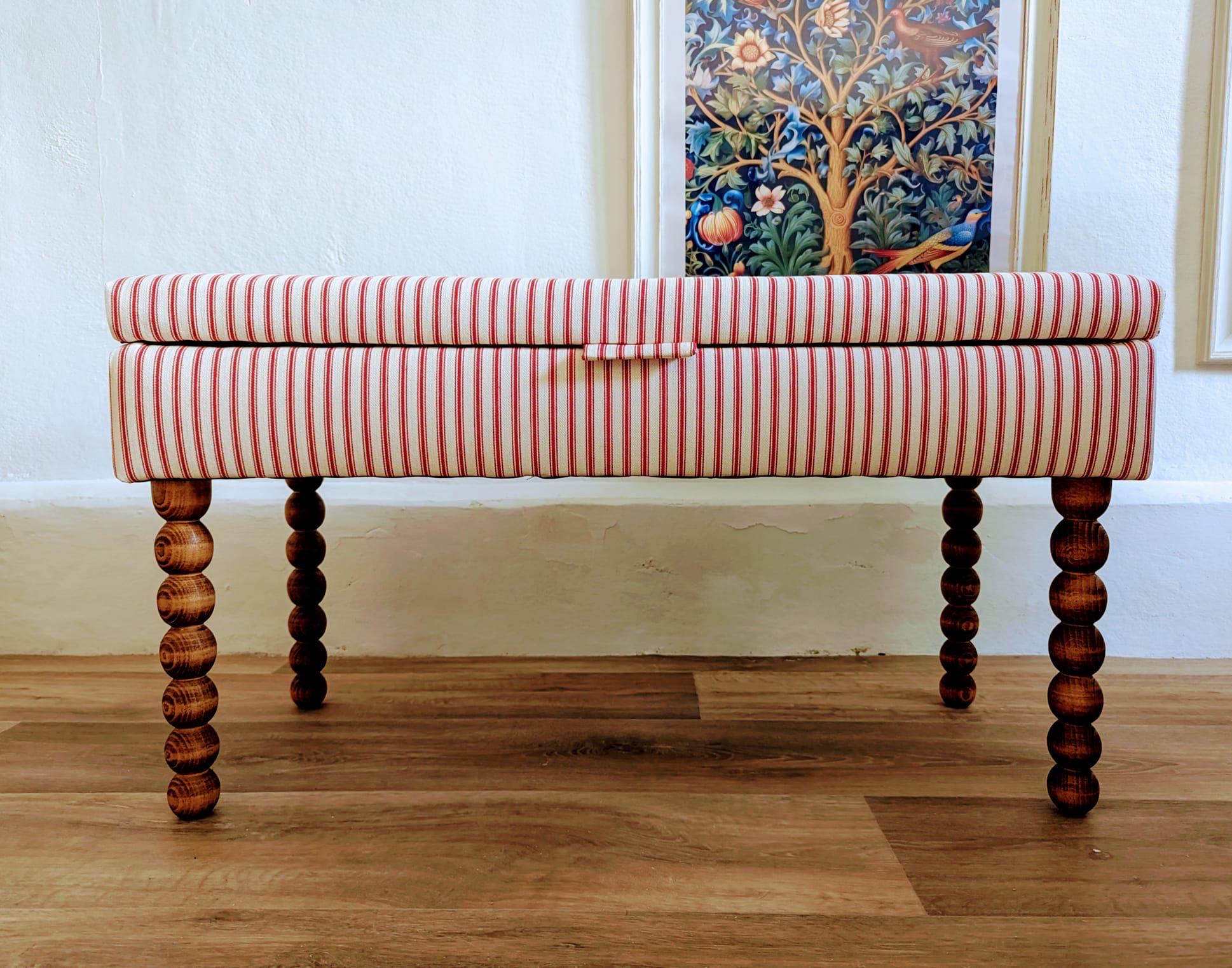 Upholstered bench, hallway or end of bed storage bench in ticking fabric with bobbin legs