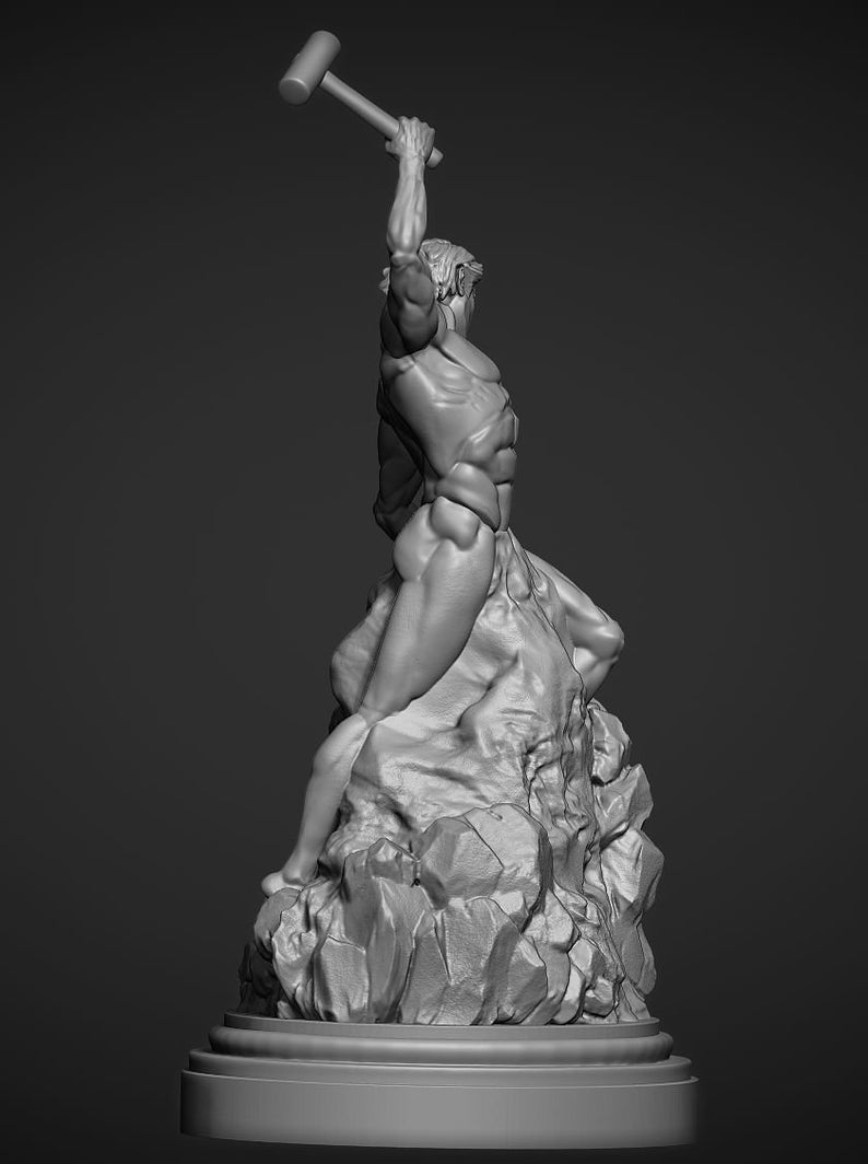 Opposing side view of the statue. A render of the statue. The man is in an action pose, heaving his hammer skyward to crash onto the chisel he is using to sculpt himself from the rock.