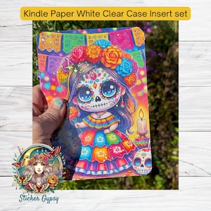 May include: A colorful sticker featuring a Day of the Dead-themed illustration of a girl with a sugar skull face, wearing a floral crown and a colorful dress. The sticker is surrounded by a glittery background and has a holographic effect.