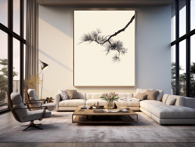 May include: A large rectangular wall art piece featuring a black ink-style illustration of a pine tree branch with needles against a solid cream-colored background, framed in a thin dark border and mounted on a light-colored interior wall.