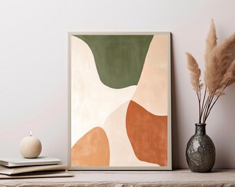 May include: A rectangular wall art print featuring an abstract composition of organic, fluid shapes in muted olive green, terracotta orange, light peach, and cream colors, enclosed within a thin, light-colored wooden frame.