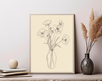 May include: A framed wall art print featuring a black line drawing of a bouquet of flowers in a vase against a light cream background. The artwork displays a simple, continuous line style depicting several blossoms and stems in a vase.