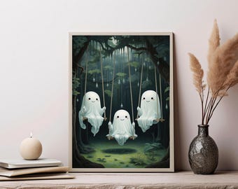 May include: A framed wall art print depicting three white ghosts with simple black eyes and mouths sitting on wooden swings suspended from dark forest trees. The scene features a misty, green-toned woodland background with hanging droplets.