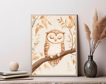 May include: A framed wall art print featuring a light brown owl with closed eyes perched on a tree branch. The illustration is rendered in soft shades of beige and tan, surrounded by delicate autumn leaves and branches in a warm, neutral color palette.