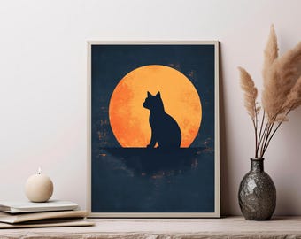 May include: A rectangular wall art print featuring a dark blue background with a large, textured orange circular moon. A black silhouette of a cat sits in profile on a horizontal line, centered against the moon. The print is framed in a light wood.
