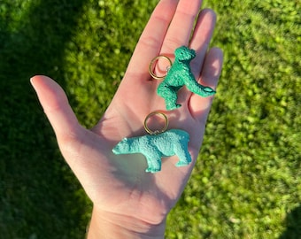 Pendientes de aro dorados de oso polar y gorila Silly Circus