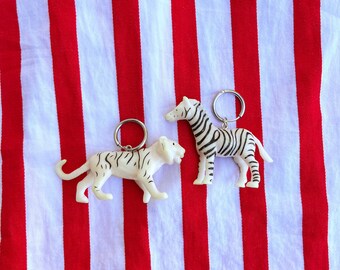 Pendientes de aro Silly Circus con cebra y tigre en blanco y negro