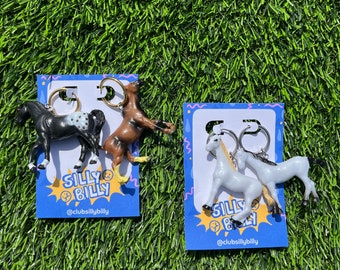 Pendientes de caballo de juguete