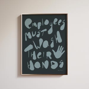 May include: A set of three ceramic mugs with a speckled, matte finish in cream, light grey, and dark grey. Each mug has a simple, minimalist design, ideal for coffee or tea.