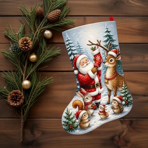 May include: A Christmas stocking featuring a printed illustration of Santa Claus, a reindeer, and woodland animals including a squirrel, rabbit, and hedgehog in a snowy forest setting. The stocking has a red hanging loop at the top edge.