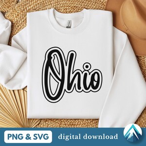 May include: White sweatshirt with black text that says "Ohio" in a handwritten style.