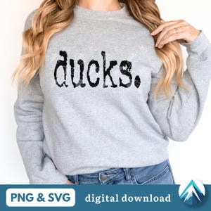 グランジ ダックス デジタル ダウンロード、PNG および SVG ファイル、透明な背景、レトロなタイプライター、ヴィンテージ風、学校のスポーツ チーム向け
