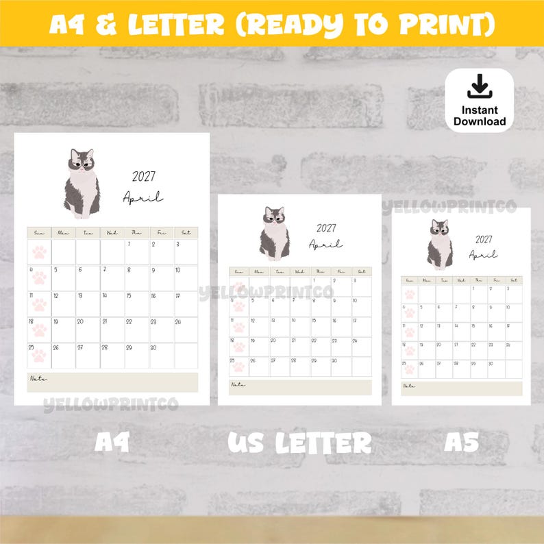 May include: A printable 2027 April calendar page featuring a grey and white cat illustration at the top. The grid displays dates from 1 to 30 with small pink paw prints in the Sunday column. The text includes 2027, April, and Note at the bottom.