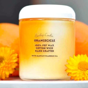 One hundred percent soy wax, hand crafted, cotton wick, eight ounce orange scented candle.