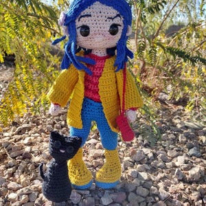 Coraline doll with her cat
