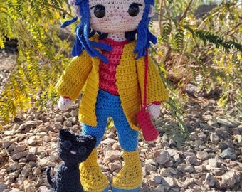 Coraline doll with her cat
