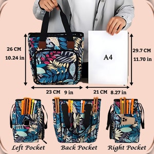 May include: A black tote bag with a colorful floral print. The bag has a zippered pocket on the front and two side pockets. The bag is 10.24 inches tall, 9 inches wide, and 8.27 inches deep. The bag is shown next to a piece of paper labeled "A4".