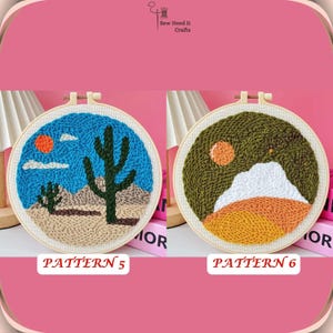 May include: Two embroidery hoop art pieces with desert scenes. The first hoop features a blue sky with white clouds, a red sun, a green cactus, and a tan desert landscape. The second hoop features a green sky with a white cloud, a yellow sun, a tan desert landscape, and a white mountain. Both hoops have the text "PATTERN" followed by a number.