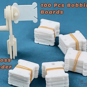 May include: A white floss winder and 100 white bobbin boards, secured with tan bands, are shown against a blue backdrop. Text reads "100 Pcs Bobbin Boards" and "1 Floss Winder". Suitable for organising embroidery floss.