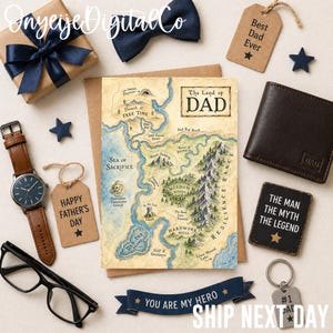 May include: A collection of Father's Day gifts, including a map-themed card, a brown leather wallet, a watch with a brown strap, a bow tie, and gift tags. The card reads "The Land of Dad."