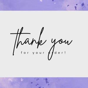 May include: A white card with the words "thank you for your order!" in black script. The card is set against a watercolor-style background of purple and lavender hues, with subtle paint splatters.