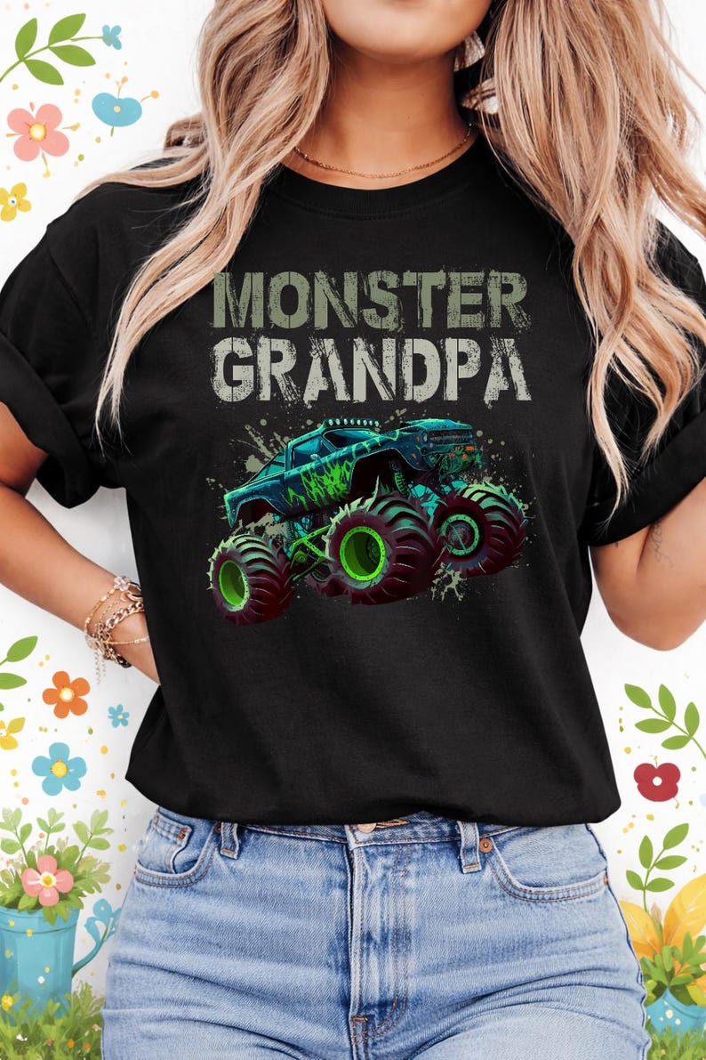 May include: Black t-shirt with the text "MONSTER GRANDPA" in distressed white and green lettering. The shirt features a graphic of a monster truck in shades of blue and green with large, green wheels.
