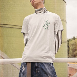 Add a touch of sunshine to your day with this Easy Peasy Lemon Squeezy t-shirt. The playful lemon graphic and lighthearted message capture the essence of summery fun. A perfect addition for any casual outfit, Salthree Shirts