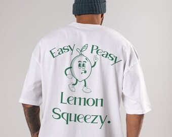 May include: White t-shirt with a green lemon graphic and the text "Easy Peasy Lemon Squeezy."