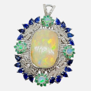 Ethiopian Opal Sterling Silver Pendant: Emerald, Kyanite & Diamond Accent