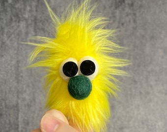 Fuzziez- Yellow Fuzzy Monster Finger Puppet with Green Nose