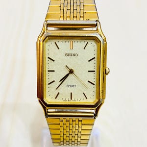 Seiko Spirit Gold Tone Tank 5E31