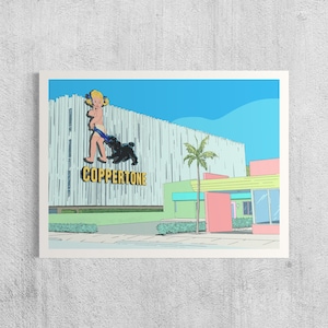 May include: A framed print featuring a retro illustration of a building with a sign that reads "Coppertone". The artwork depicts a woman and a dog, with a palm tree and a building in the background. The color palette includes blue, pink, and green.